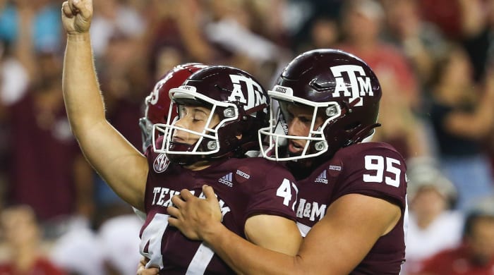 Texas A&M Aggies punter Nik Constantinou (95) celebrates Texas A&M Aggies place kicker Seth Small (47) 28 yard game game winning field goal against the Alabama Crimson Tide in the fourth quarter